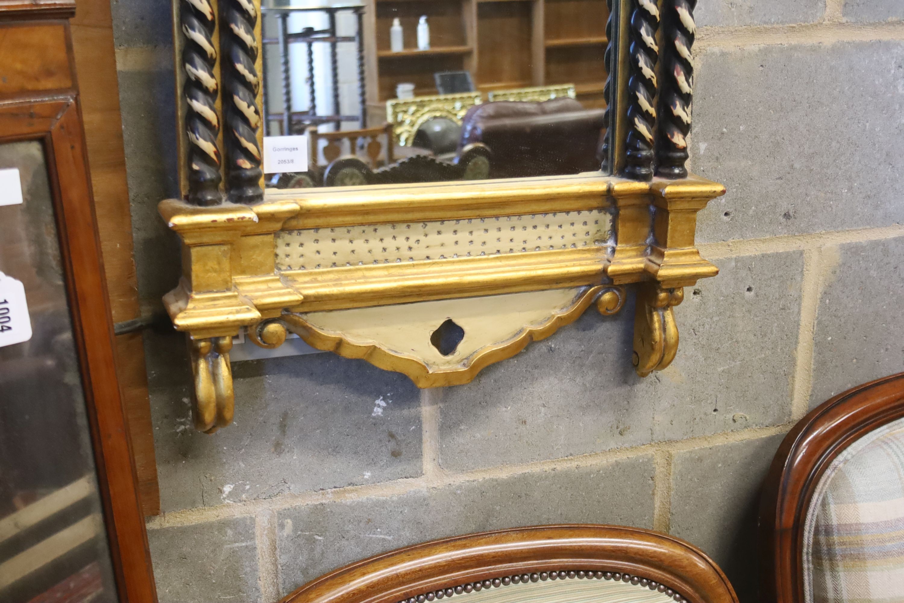 A large reproduction Gothic style gilt wood pier glass, width 54cm, height 145cm